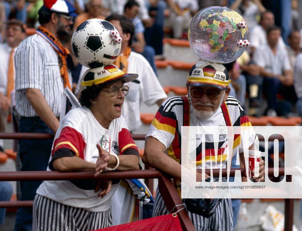 FIFA World Cup, WM, Weltmeisterschaft, Fussball 1990 24 6 1990 Football World Cup 1990 West Germany v Holland - Two elderly German fans standing with interesting head wear. Photo: Mark Leech Offside Milan Italy