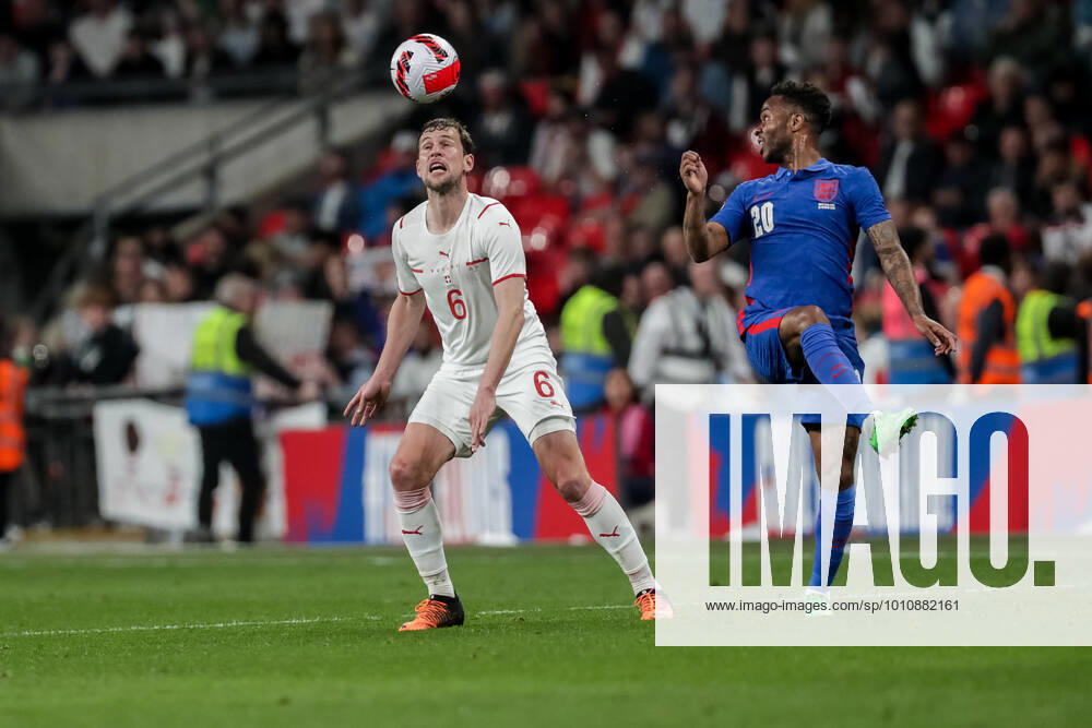 during the International Friendly, Länderspiel, Nationalmannschaft match between England and Switzerland at Wembley Stadium on March 26, 2022 in London, United Kingdom. Fabian Frei of Switzerland against Raheem Sterling of England London Wembley Stadium England United Kingdom