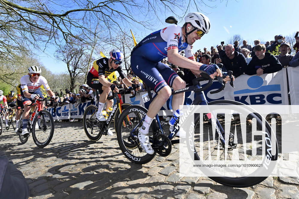 KW12 Belgian Jasper Stuyven of Trek-Segafredo, Belgian Wout Van Aert of Team Jumbo-Visma and Danish Kasper Asgreen of Quick-Step Alpha Vinyl pictured in action during the men s Gent-Wevelgem - In Flanders Fields cycling race, 248,9km from Ieper to Wevelgem, Sunday 27 March 2022. DIRKxWAEM x26845452x