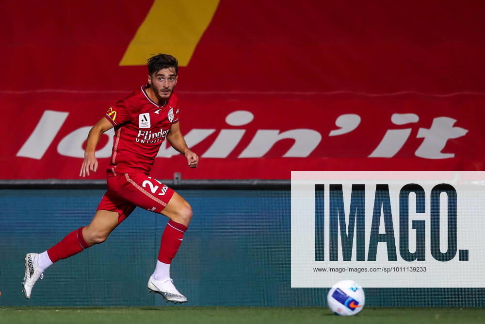 ALEAGUE ADELAIDE MACARTHUR, Joshua Cavallo of Adelaide United chased by Jake McGing of the Bulls during the A-League match between Adelaide United and Macarthur FC at Coopers Stadium in Adelaide, Friday, April 8, 2022. ( NO ARCHIVING, , NO USE IN BOOKS WITHOUT CONSENT ADELAIDE SA AUSTRALIA