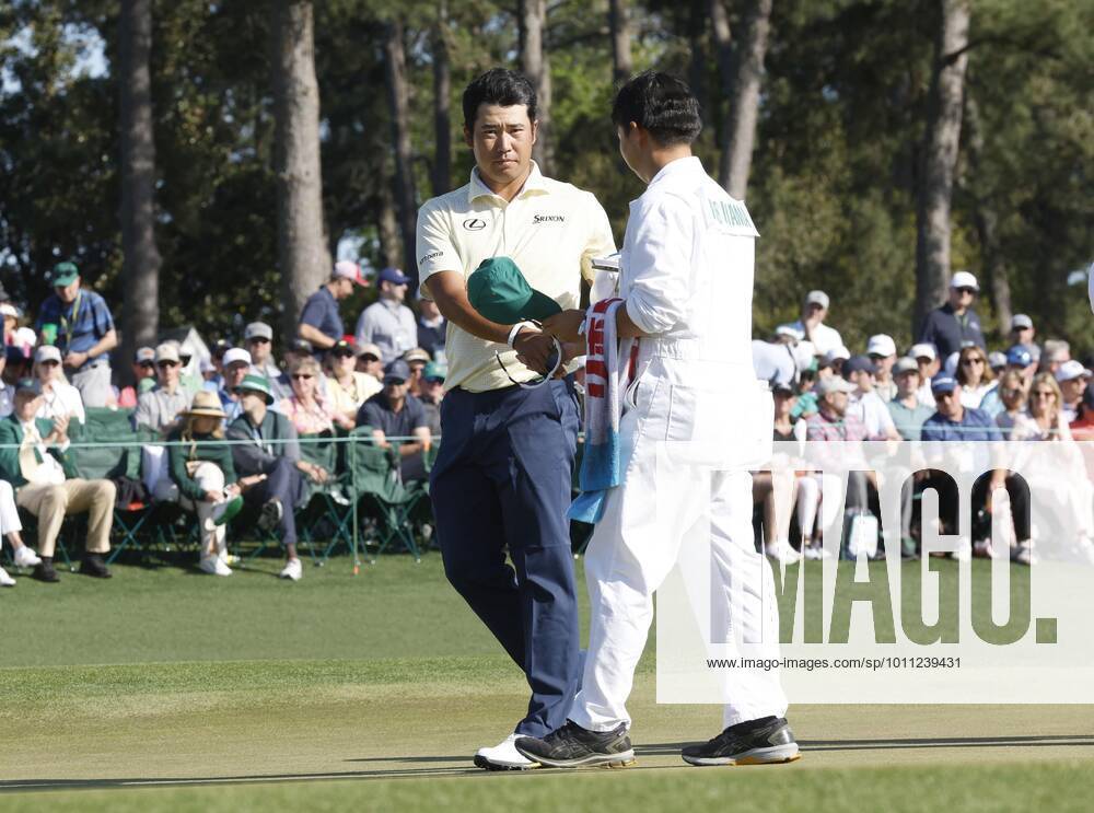 Golf: Masters Tournament Japan s Hideki Matsuyama (L) completes his final round of the Masters Tournament on April 10, 2022, at Augusta National Golf Club in Augusta, Georgia. A14AA0001278644P