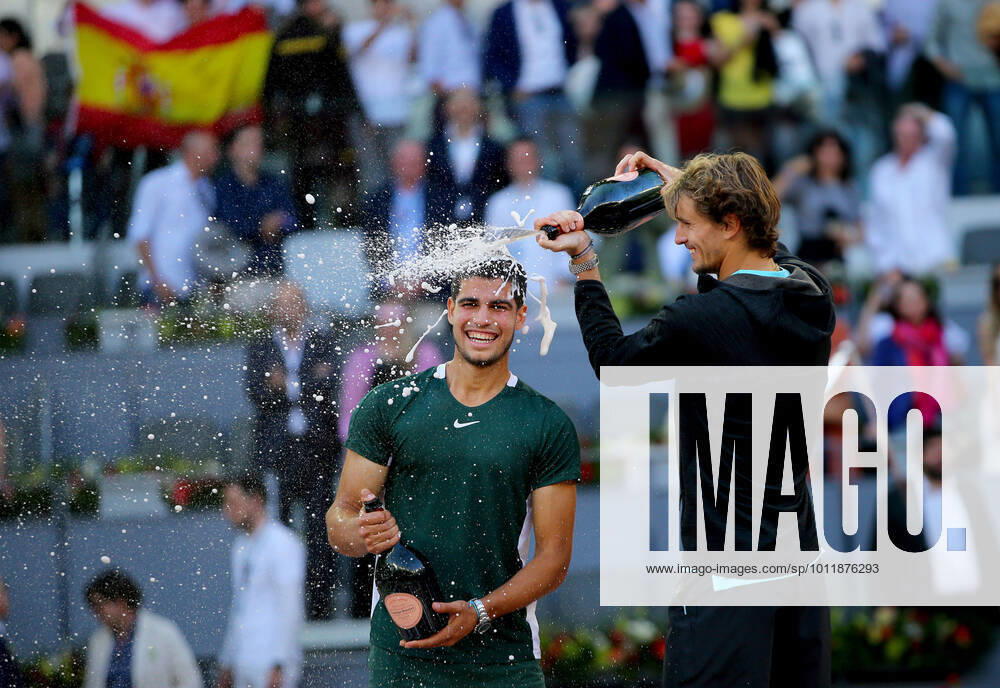 KW18 Mandatory Credit: Photo by Ella Ling Shutterstock (12927155r) Carlos Alcaraz of Spain celebrates with Alexander Zverev of Germany who sprays champagne on his head Mutua Madrid Open, Tennis, La Caja Magica, Madrid, Spain - 08 May 2022 Mutua Madrid Open, Tennis, La Caja Magica, Madrid, Spain