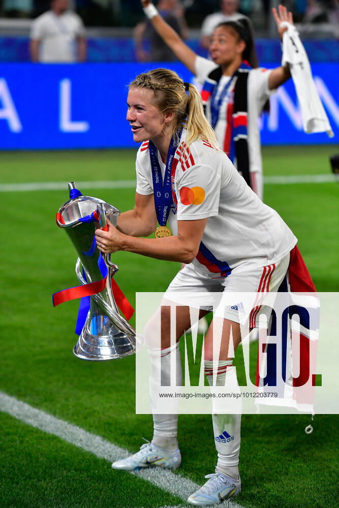 FC Barcelona, Barca v Olympique Lyon, UEFA Women?s Champions League final, football, Turin, Italy Turin, Italy. 21st, May 2022. Ada Hegerberg (14) of Olympique Lyon is celebrating and seen with the Champions League trophy after the UEFA Women?s Champions League final between Barcelona and Olympique Lyon at Juventus Stadium in Turin. Turin Italy
