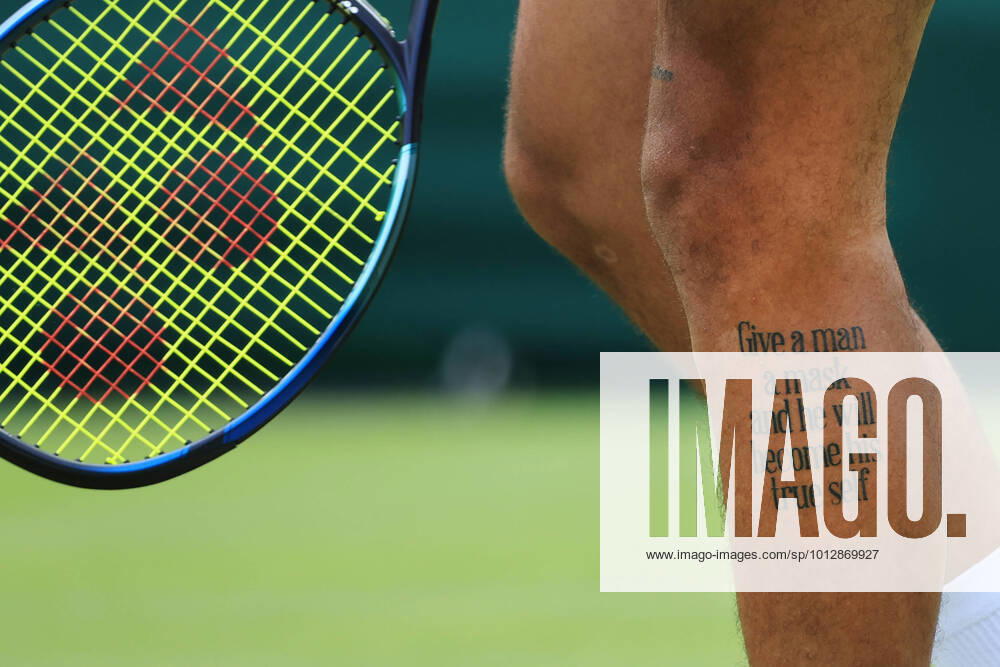 KW26 Tennis - Wimbledon (Day 2) 28th June 2022 - Tennis - Wimbledon (Day 2) - A tattoo on the leg of Nick Kyrgios (AUS) during his Gentlemen s Singles 1st Round match against Paul Jubb (GBR) - Photo: Simon Stacpoole Offside. London UK
