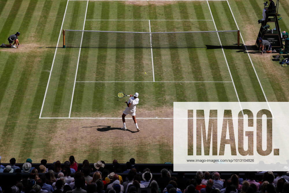 10th July 2022, All England Lawn Tennis and Croquet Club, London, England; Wimbledon Tennis tournament, mens singles final; Nick Kyrgios (AUS) plays a forehand to Novak Djokovic (SRB) in front of a packed Centre Court ActionPlus12407336 JohnxPatrickxFletcher Content restricted for UK based newspaper