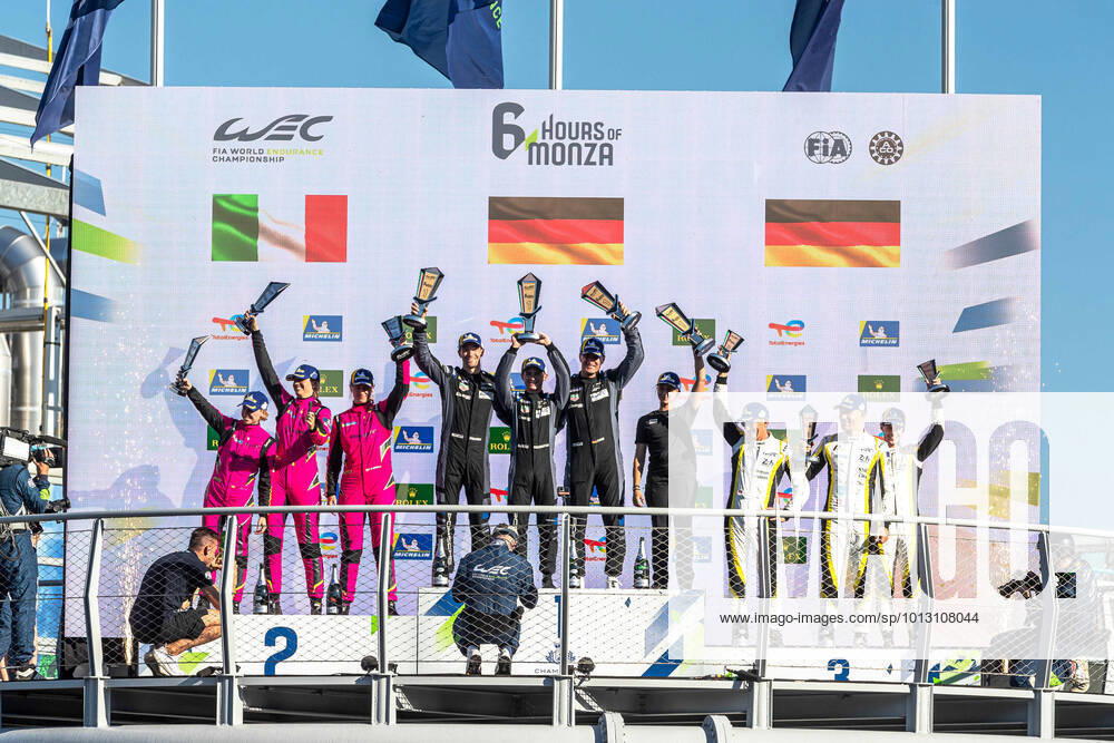 KW27 LMGTE AM PODIUM - P1: 77 DEMPSEY-PROTON RACING (DEU) PORSCHE 911 RSR 19 (LMGTE AM) - CHRISTIAN RIED (DEU) - SEBASTIAN PRIAULX (GBR) - HARRY TINCKNELL (GBR) - P2: 85 IRON DAMES (ITA) FERRARI 488 GTE EVO (LMGTE AM) - RAHEL FREY (CHE) - MICHELLE GATTING (DNK) - SARAH BOVY (BEL) - P3: 46 TEAM PROJECT 1 (DEU) PORSCHE 911 RSR 19 (LMGTE AM) - MATTEO CAIROLI (ITA) - MIKKEL PEDERSEN (DNK) - NICHOLAS LEUTWILER (CHE) DURING THE 6 HOURS OF MONZA, PODIUM, FOURTH ROUND OF THE 2022 FIA WORLD ENDURANCE CHAMPIONSHIP (FIA WEC),RACE, AT AUTODROMO NAZIONALE MONZA, MONZA, ITALY, JULY 07-10 2022 MOTORSPORT : FIA WEC - 6 Heures de Monza - Endurance - 10 07 2022 MotorsportImages Panoramic