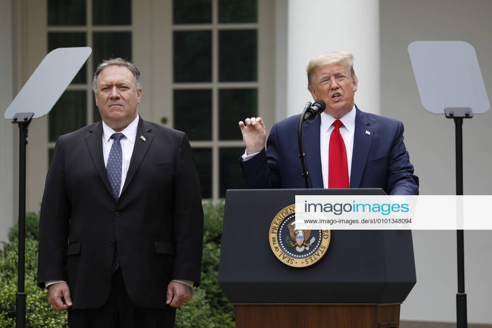 U.S. President Donald Trump delivers remarks next to Secretary of State Mike Pompeo (L) in the Rose Garden of the White House in Washington, DC on Friday, May 29, 2020. Trump announced sanctions on China in regards to Hong Kong, and also terminated the United States relationship with the World Health Organization. WAX20200529107 YurixGripas