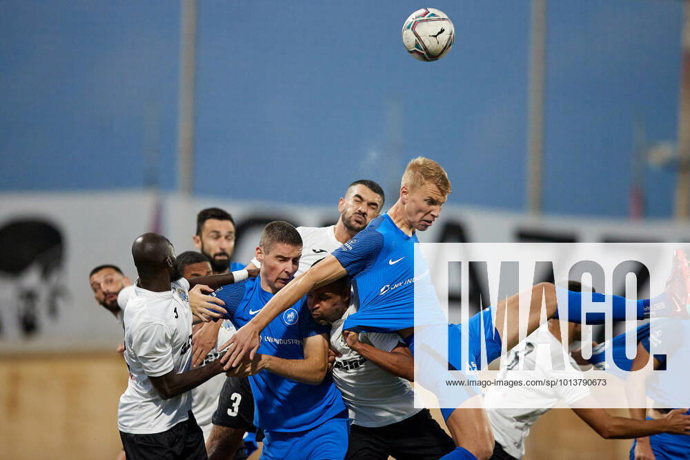 TA QALI, MALTA - 11 AUGUST 2022 Ferdinando Apap (C) of Hibernians FC heads the ball first during an agitated corner kick action during the third qualifying round, 2nd leg soccer match, from the UEFA Europa Conference League between Hibernians and RFS at the Centenary Stadium, Ta Qali, Malta on 11 August 2022. Photo Domenic Aquilina UECL - Hibernians (MLT) Hibernians FC v RFS (LVA) UECL_22_23