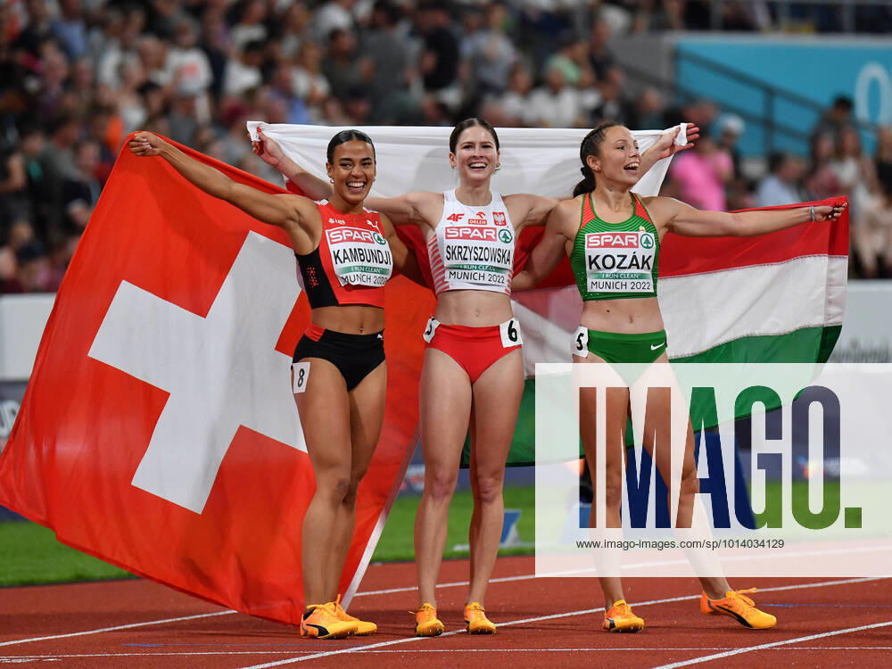 KW33 Die Siegerinnen KAMBUNDJI Ditaji (Schweiz) SKRZYSZOWSKA Pia (Polen) und KOZAK Luca (Ungarn) beim 100m Hürdenlauf Wettbewerb der European Championships 2022 in München am 21.08.2022. München Olympiastadion Bayern Deutschland