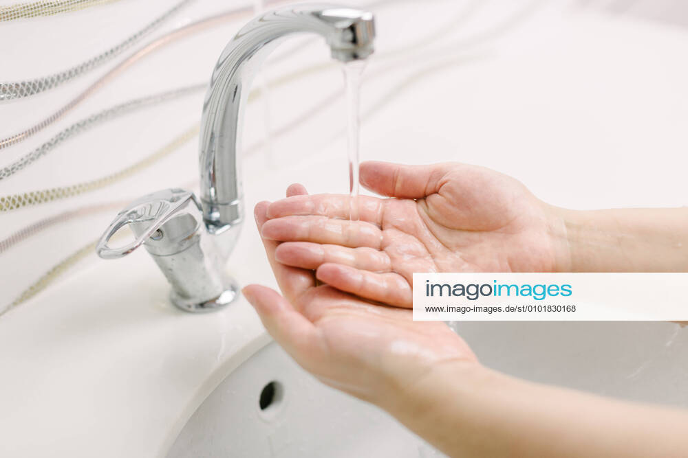 Woman washes her hands by surgical hand washing method. ?stanbul, ?stanbul, Turkey CR_EMKA200615-373819-01