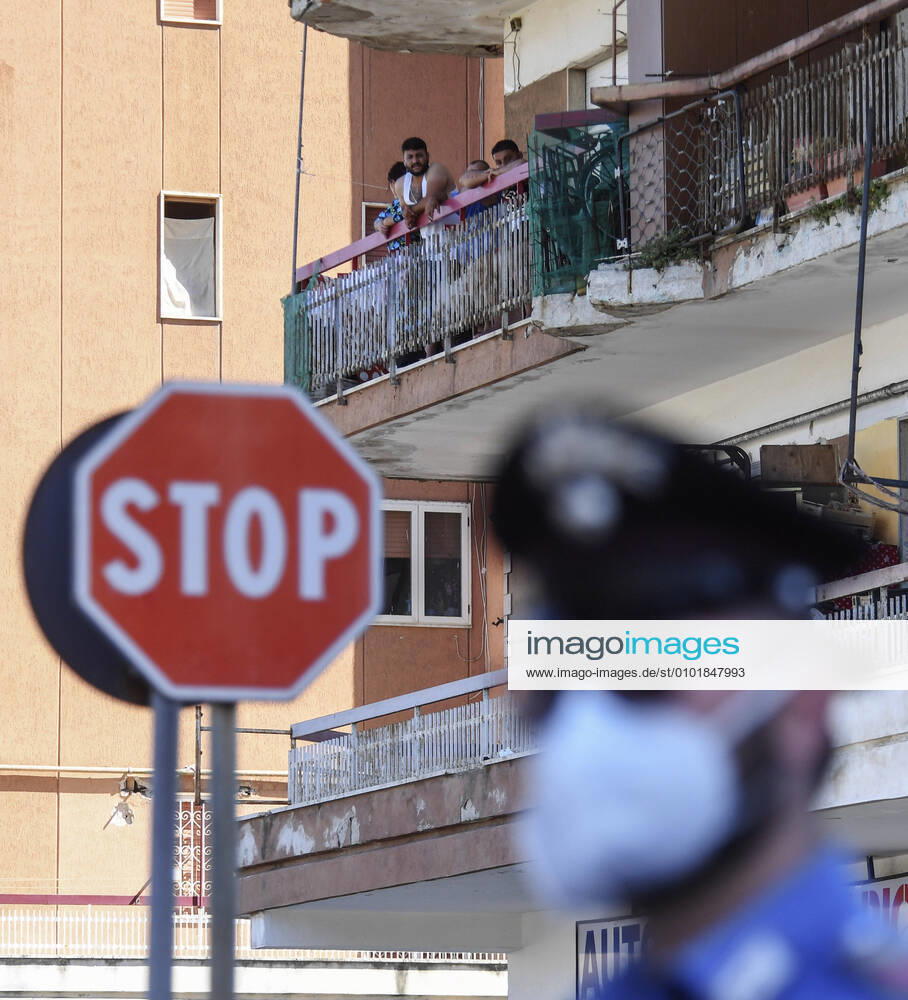 Italian police and Army personnel surround the red zone, where 49 new cases of coronavirus infections were confirmed, in Mondragone, Southern Italy.