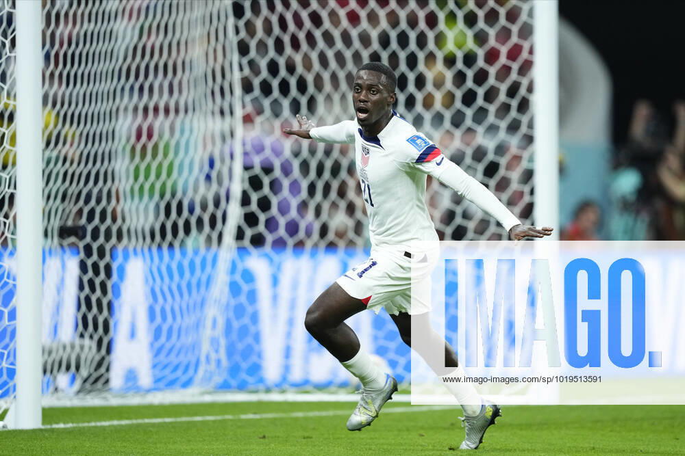 USA v Wales: Group B - FIFA World Cup, WM, Weltmeisterschaft, Fussball Qatar 2022 Timothy Weah Centre-Forward of USA and LOSC Lille celebrates after scoring his sides first goal during the FIFA World Cup Qatar 2022 Group B match between USA and Wales at Ahmad Bin Ali Stadium on November 21, 2022 in Doha, Qatar. Doha Qatar