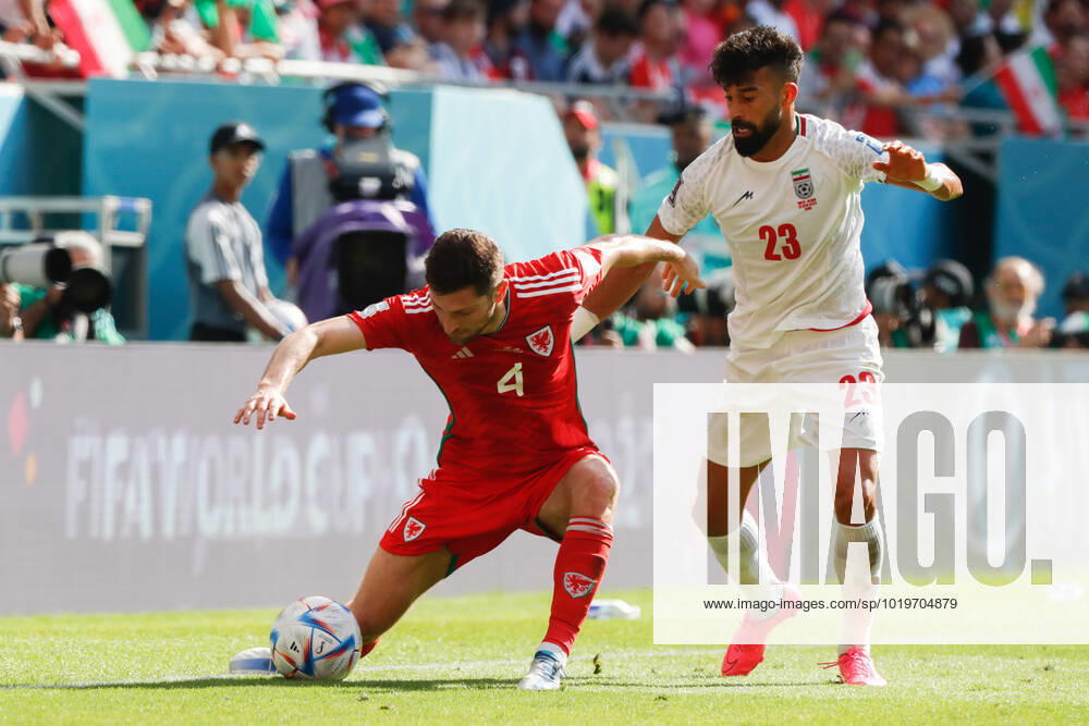 Wales v Iran 2022 FIFA World Cup, WM, Weltmeisterschaft, Fussball Ben Davies of Wales is challenged by Ramin Rezaeian of Iran during the 2022 FIFA World Cup Group B match at Ahmad Bin Ali Stadium, Al-Rayyan Content Not Available For UK Newspapers