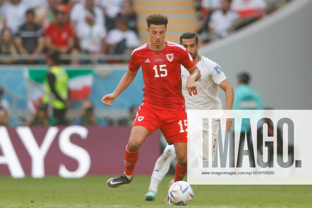Wales v Iran 2022 FIFA World Cup, WM, Weltmeisterschaft, Fussball Ethan Ampadu of Wales holds the ball up from Ehsan Hajsafi of Iran during the 2022 FIFA World Cup Group B match at Ahmad Bin Ali Stadium, Al-Rayyan Content Not Available For UK Newspapers