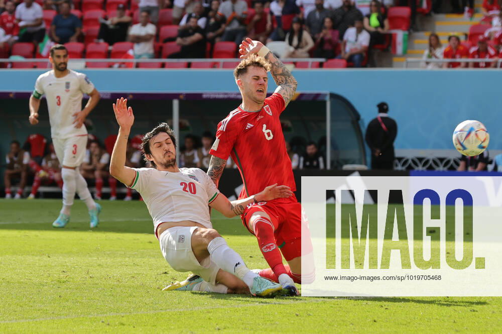 Wales v Iran 2022 FIFA World Cup, WM, Weltmeisterschaft, Fussball Sardar Azmoun of Iran clashes with Joe Rodon of Wales during the 2022 FIFA World Cup Group B match at Ahmad Bin Ali Stadium, Al-Rayyan Content Not Available For UK Newspapers