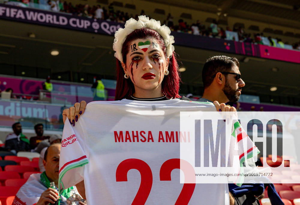 Wales v Iran 2022 FIFA World Cup, WM, Weltmeisterschaft, Fussball 25 11 2022. Match 17 Iran fan protest with a Mahsa Armini shirt (arrested for not wearing a hijab) during the 2022 Fifa World Cup match between Wales and Iran at Ahmad bin Ali Stadium, Al Rayyan, Qatar on 25 November 2022. Editorial use only ,