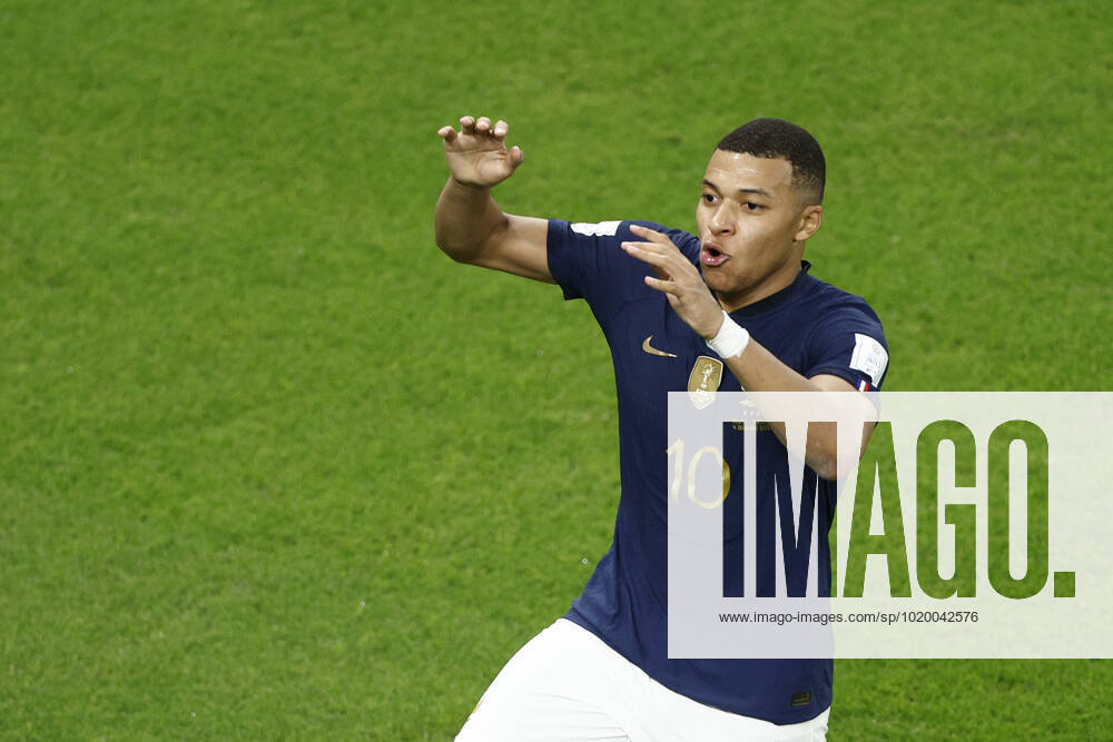 Kylian Mbappe of France celebrates a goal during the FIFA round 16 soccer match between France and Poland at Al Thumama a stadium in Doha, Qatar, 04 December 2022. World Cup 2022: France vs. Poland !ACHTUNG: NUR REDAKTIONELLE NUTZUNG!