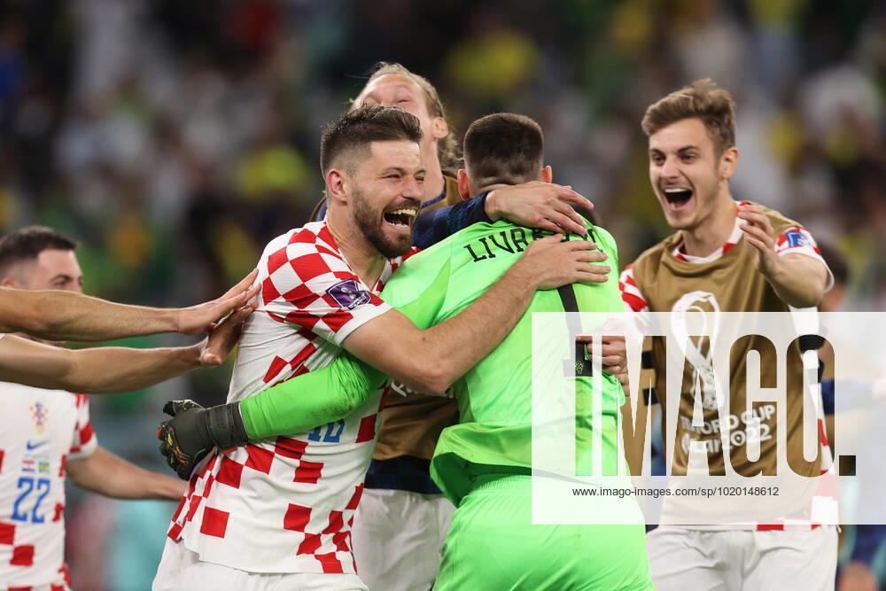 Croatia v Brazil : FIFA World Cup, WM, Weltmeisterschaft, Fussball 9 December 2022, Doha - FIFA World Cup Qatar 2022 - Quarter-Finals - Croatia v Brazil - Bruno Petkovic of Croatia celebrates victory with his team mates- Photo: Charlotte Wilson Offside. Doha Qatar