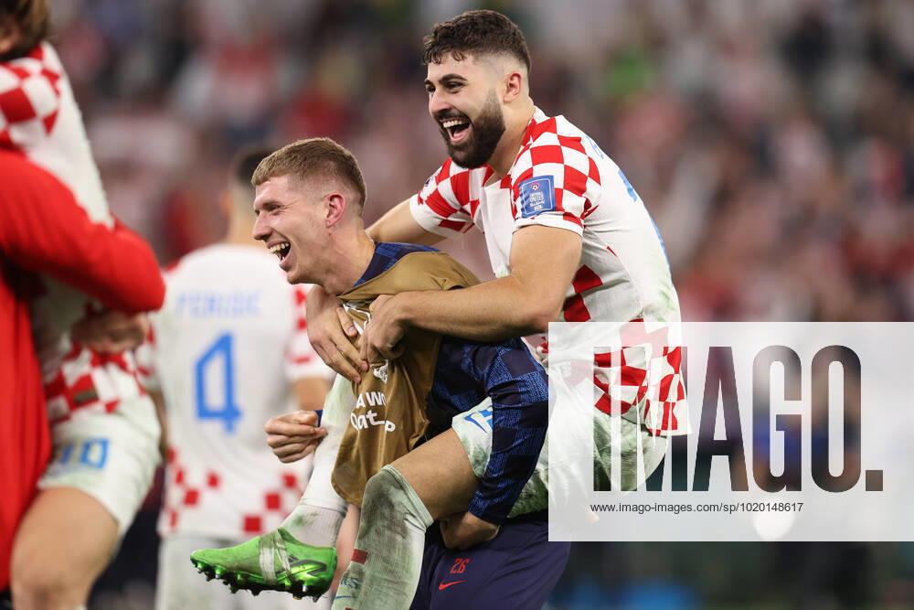 Croatia v Brazil : FIFA World Cup, WM, Weltmeisterschaft, Fussball 9 December 2022, Doha - FIFA World Cup Qatar 2022 - Quarter-Finals - Croatia v Brazil - Josko Gvardiol of Croatia and Kristijan Jakic of Croatia celebrate victory - Photo: Charlotte Wilson Offside. Doha Qatar