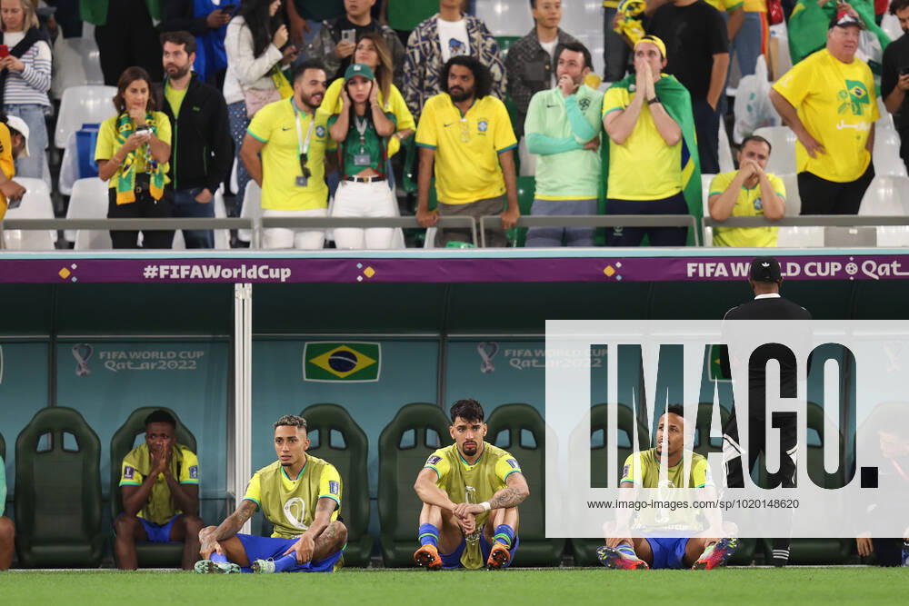 Croatia v Brazil : FIFA World Cup, WM, Weltmeisterschaft, Fussball 9 December 2022, Doha - FIFA World Cup Qatar 2022 - Quarter-Finals - Croatia v Brazil - Raphinha of Brazil, Lucas Paqueta of Brazil and Eder Militao of Brazil looks dejected after his team are knocked out of the World Cup - Photo: Charlotte Wilson Offside. Doha Qatar