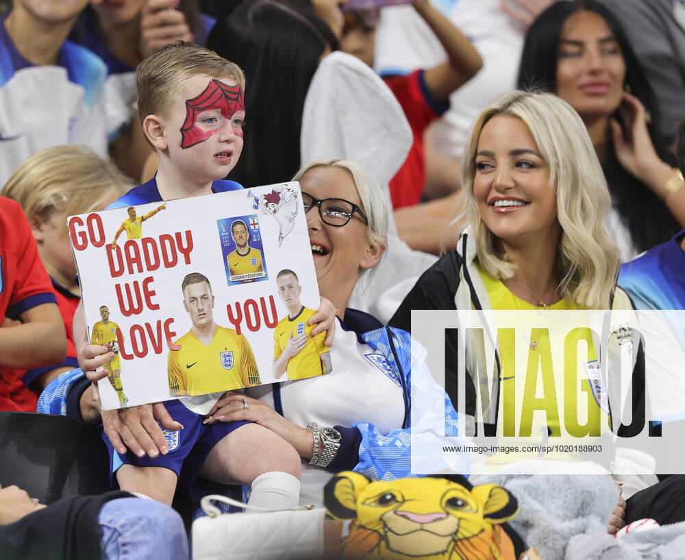 England v France 2022 FIFA World Cup, WM, Weltmeisterschaft, Fussball Megan Davison, wife of Jordan Pickford and family holds a sign before the 2022 FIFA World Cup Quarter-final match at Al Bayt Stadium, Al Bayt Content Not Available For UK Newspapers