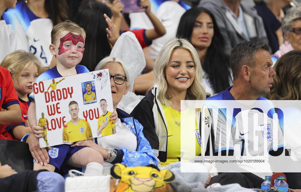 England v France 2022 FIFA World Cup, WM, Weltmeisterschaft, Fussball Megan Davison, wife of Jordan Pickford and family holds a sign before the 2022 FIFA World Cup Quarter-final match at Al Bayt Stadium, Al Bayt Content Not Available For UK Newspapers