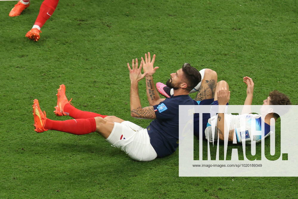 England v France : FIFA World Cup, WM, Weltmeisterschaft, Fussball 10 December 2022, Al Kohr - FIFA World Cup Qatar 2022 - Quarter-Finals - England v France - Olivier Giroud of France and John Stones of England - Photo: Charlotte Wilson Offside. Al Kohr Qatar