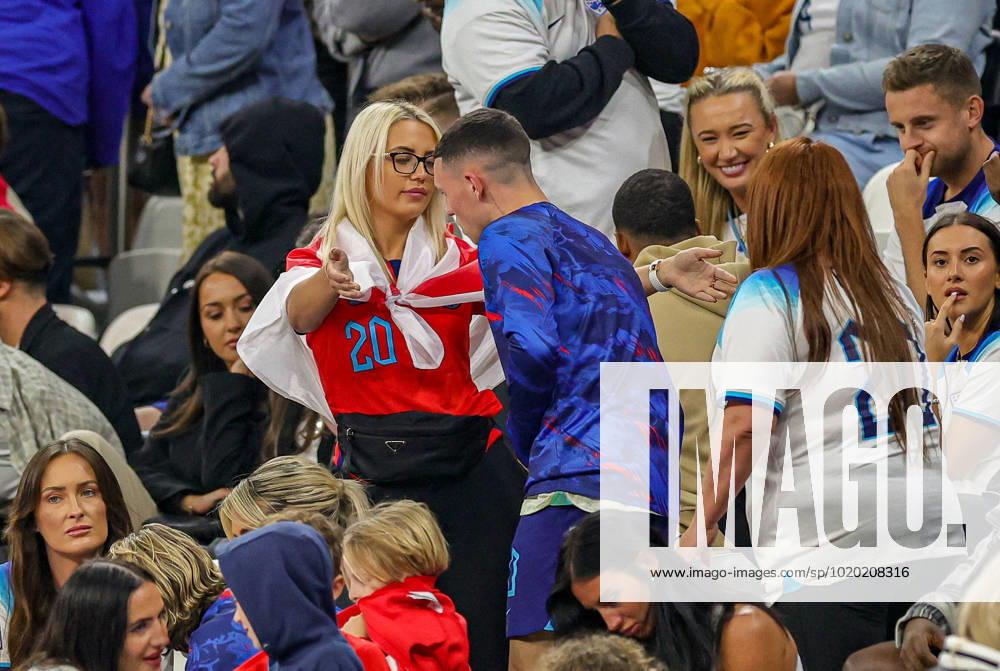 England v France 2022 FIFA World Cup, WM, Weltmeisterschaft, Fussball 10 12 2022. Quarter-finals Phil Foden (20) of England is comforted by girlfriend Rebecca Cooke at full time during the 2022 FIFA World Cup quarter final match between England and France at Al Bayt Stadium, Al Khor, Qatar on 10 December 2022. Editorial use only ,