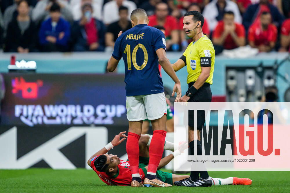Jawad El Yamiq of Morocco in a discussion with Kylian Mbappe of France during the FIFA World Cup, WM, Weltmeisterschaft, Fussball 2022 semifinal between France and Morocco on December 14, 2022 in Doha. Photo: Joel Marklund BILDBYRAN kod JM JM0412 bbeng fotboll football soccer fotball vm fotbolls-vm fotball-vm fotbolls-vm 2022 fifa world cup 2022 semifinal semi-final frankrike france marocko morocco