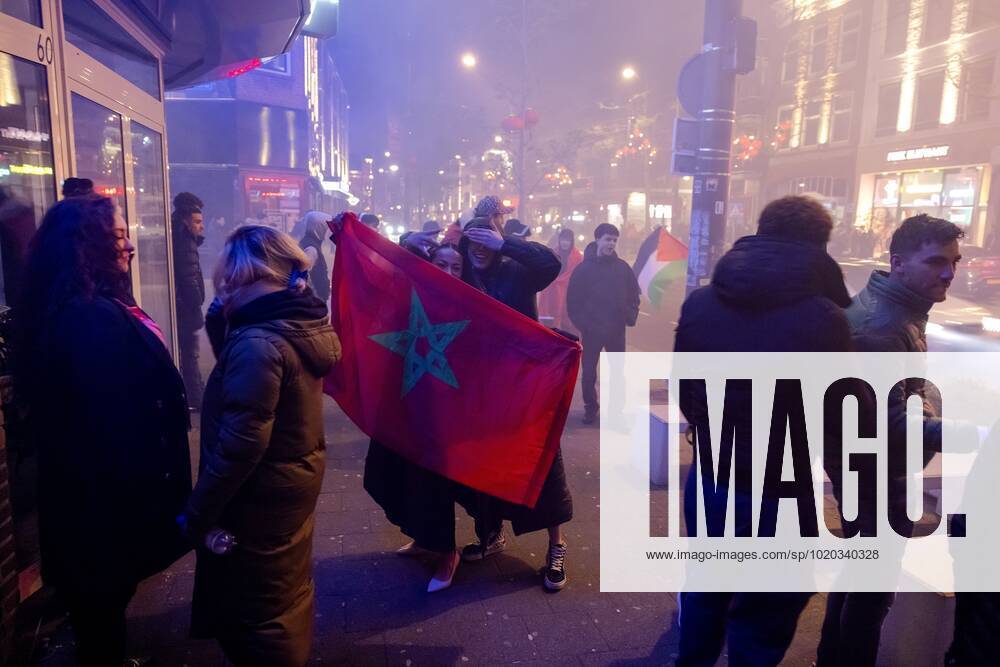 ROTTERDAM - Moroccan football supporters after the semi-final match between Morocco and France at the World Cup in Qatar. ANP JEFFREY GROENEWEG ANPxSportx IVx