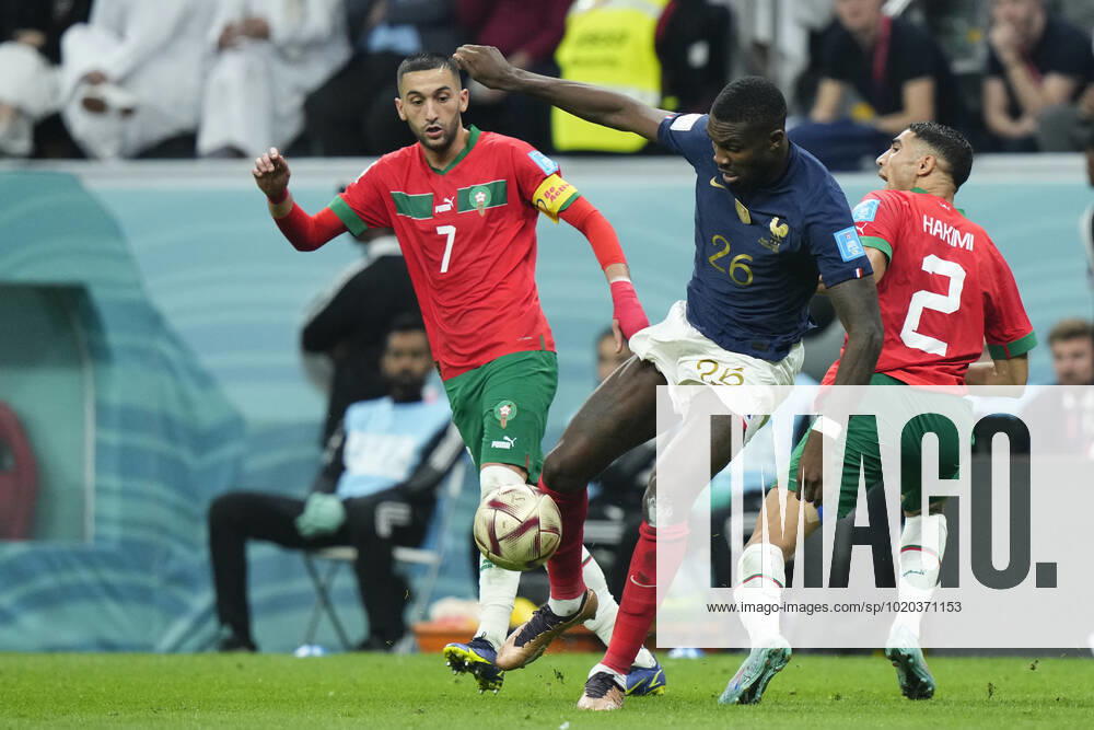 France v Morocco: Semi Final - FIFA World Cup, WM, Weltmeisterschaft, Fussball Qatar 2022 Marcus Thuram centre-forward of France and Borussia Monchengladbach and Achraf Hakimi right-back of Morocco and Paris Saint-Germain compete for the ball during the FIFA World Cup Qatar 2022 semi final match between France and Morocco at Al Bayt Stadium on December 14, 2022 in Al Khor, Qatar. Al Khor Qatar
