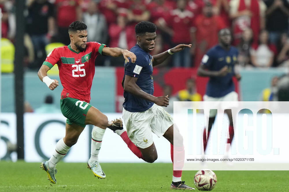 France v Morocco: Semi Final - FIFA World Cup, WM, Weltmeisterschaft, Fussball Qatar 2022 Aurelien Tchouameni defensive midfield of France and Real Madrid and Yahia Attiat-Allah left-back of Morocco and Wydad Casablanca compete for the ball during the FIFA World Cup Qatar 2022 semi final match between France and Morocco at Al Bayt Stadium on December 14, 2022 in Al Khor, Qatar. Al Khor Qatar