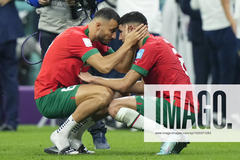 France v Morocco: Semi Final - FIFA World Cup, WM, Weltmeisterschaft, Fussball Qatar 2022 Romain Saïss centre-back of Morocco and Besiktas JK and Achraf Hakimi right-back of Morocco and Paris Saint-Germain after losing the FIFA World Cup Qatar 2022 semi final match between France and Morocco at Al Bayt Stadium on December 14, 2022 in Al Khor, Qatar. Al Khor Qatar