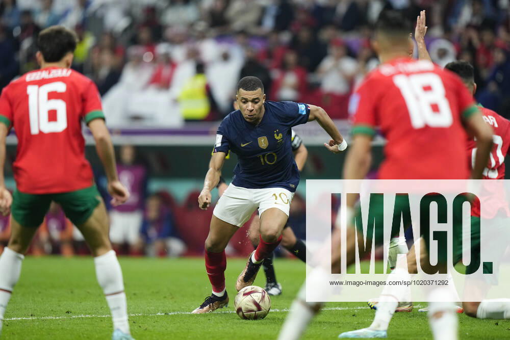 France v Morocco: Semi Final - FIFA World Cup, WM, Weltmeisterschaft, Fussball Qatar 2022 Kylian Mbappe centre-forward of France and Paris Saint-Germain surrounded by Moorocco players during the FIFA World Cup Qatar 2022 semi final match between France and Morocco at Al Bayt Stadium on December 14, 2022 in Al Khor, Qatar. Al Khor Qatar