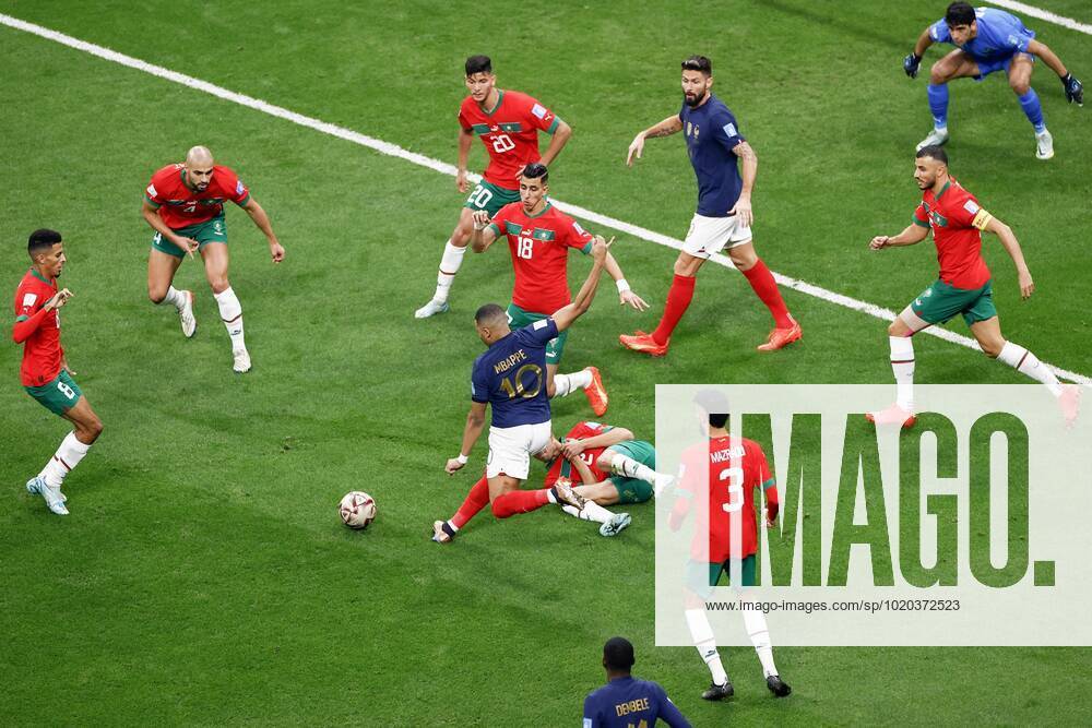 Football World Cup in Qatar France s Kylian Mbappe (10) battles with Morocco defenders during the first half a World Cup semifinal football match at Al-Bayt Stadium in Al Khor, Qatar, on Dec. 14, 2022. A14AA0001376019P