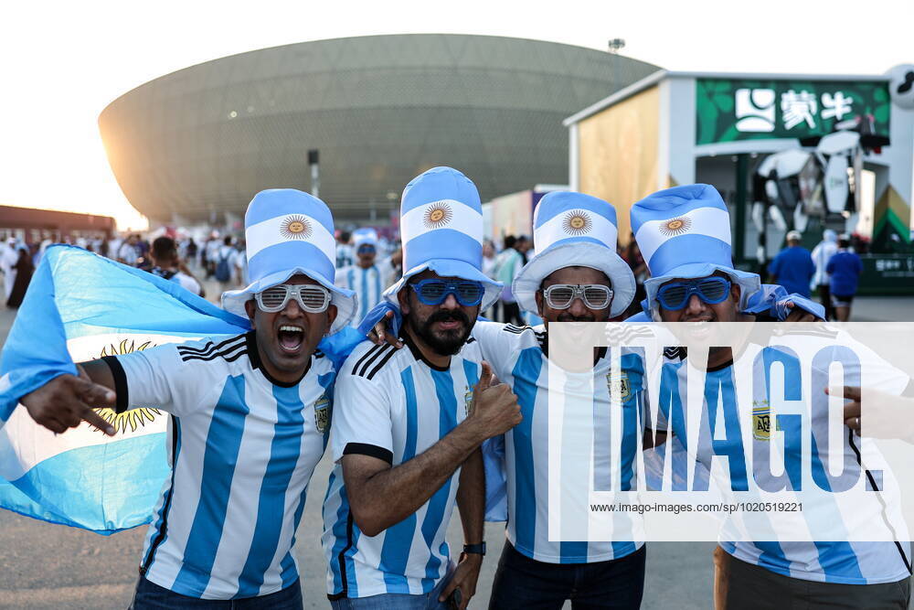 QATAR, LUSAIL - DECEMBER 18, 2022: Men root for Argentina outside Lusail Iconic Stadium ahead of the national team, Nationalteam s 2022 FIFA World Cup, WM, Weltmeisterschaft, Fussball final football match against France. Sergei Bobylev TASS 56480673