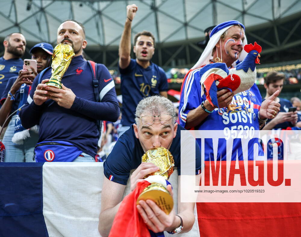 QATAR, LUSAIL - DECEMBER 18, 2022: Men root for France ahead of the national team, Nationalteam s 2022 FIFA World Cup, WM, Weltmeisterschaft, Fussball final football match against Argentina at Lusail Iconic Stadium. Sergei Bobylev TASS 56480986
