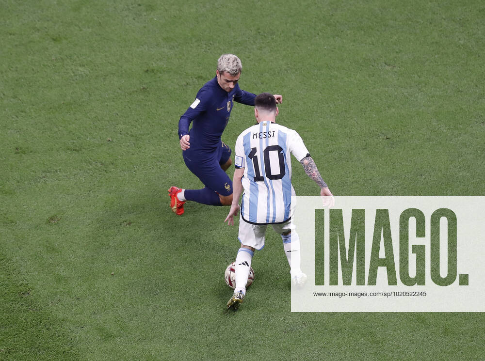 Argentina v France 2022 FIFA World Cup, WM, Weltmeisterschaft, Fussball Lionel Messi of Argentina and Antoine Griezmann of France during the 2022 FIFA World Cup Final between Argentina and France at Lusail Stadium, Lusail Content Not Available For UK Newspapers
