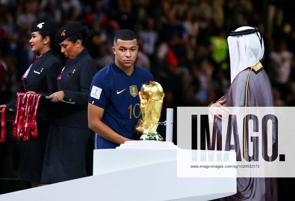 Mandatory Credit: Photo by Kieran McManus Shutterstock (13670809ha) Kylian Mbappe of France wins the golden boot and passes the World Cup trophy Argentina v France, FIFA World Cup, WM, Weltmeisterschaft, Fussball 2022, Final, Football, Lusail Stadium, Al Daayen, Qatar - 18 Dec 2022 Editorial Use Only Argentina v France, FIFA World Cup 2022, Final, Football, Lusail Stadium, Al Daayen, Qatar - 18 Dec 2022 Editorial Use Only