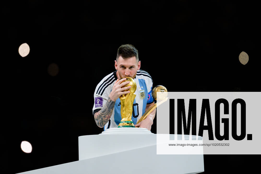 Lionel Messi of Argentina kisses the FIFA World Cup, WM, Weltmeisterschaft, Fussball Trophy after the FIFA World Cup 2022 final between Argentina and France on December 18, 2022 in Doha. Photo: Joel Marklund BILDBYRAN kod JM JM0415 bbeng fotboll football soccer fotball vm fotbolls-vm fotball-vm fotbolls-vm 2022 fifa world cup 2022 final argentina frankrike france champions world champions FIFA World Cup Champions Gold medalist jubel celebration