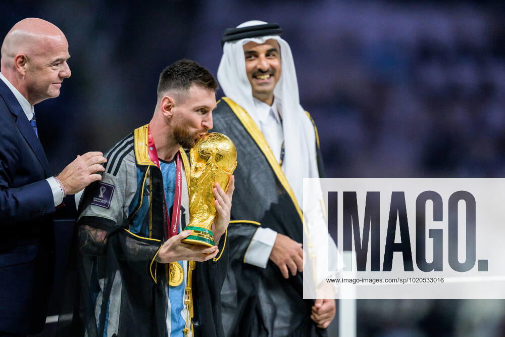 Gianni Infantino, president of FIFA, and Lionel Messi of Argentina with FIFA World Cup, WM, Weltmeisterschaft, Fussball Trophy after the FIFA World Cup 2022 final between Argentina and France on December 18, 2022 in Doha. Photo: Joel Marklund BILDBYRAN kod JM JM0415 bbeng fotboll football soccer fotball vm fotbolls-vm fotball-vm fotbolls-vm 2022 fifa world cup 2022 final argentina frankrike france champions world champions FIFA World Cup Champions Gold medalist jubel celebration