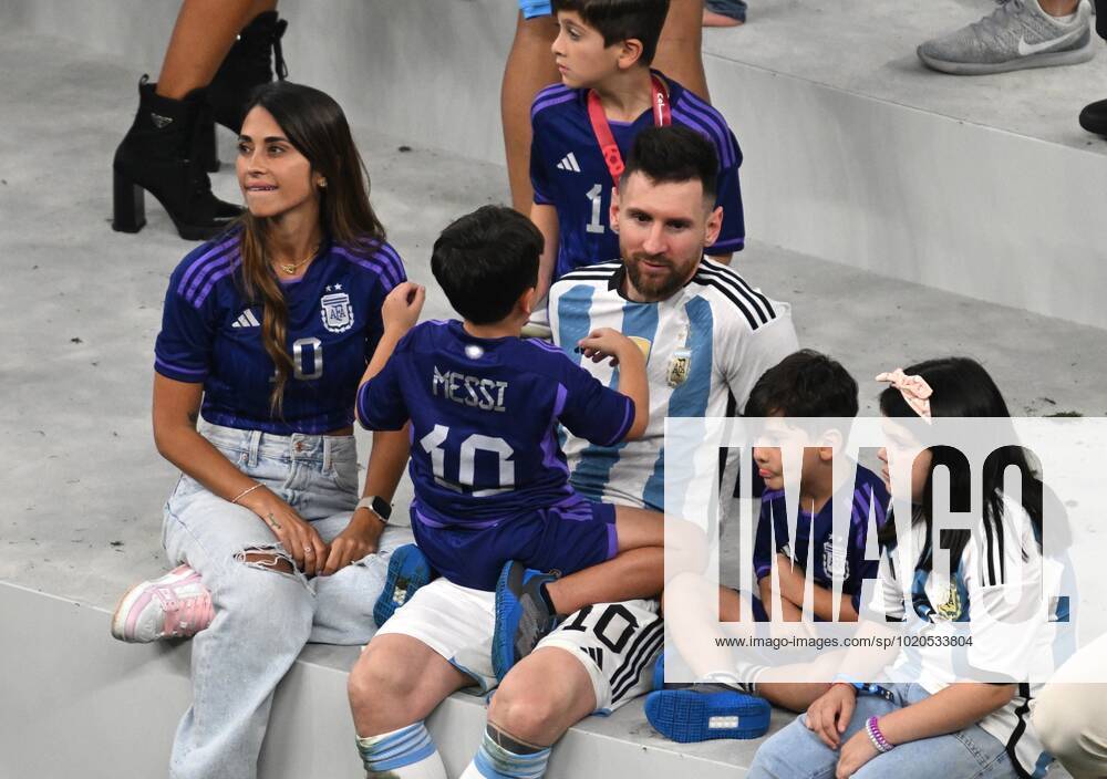 Qatar Soccer World Cup Argentina - France 8342470 18.12.2022 Argentina s Lionel Messi celebrates the team s victory with his family after the trophy ceremony following the Qatar 2022 World Cup final match between Argentina and France at the Lusail Iconic Stadium, in Lusail, Qatar. Grigory Sysoev Sputnik Lusail Qatar