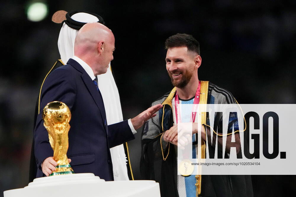 QAT: Argentina v France. FIFA World Cup, WM, Weltmeisterschaft, Fussball Qatar 2022. Final Lionel Messi of Argentina receives the World Cup trophy during the FIFA World Cup Qatar 2022 match, Final, between Argentina and France played at Lusail Stadium on Dec 18, 2022 in Lusail, Qatar.