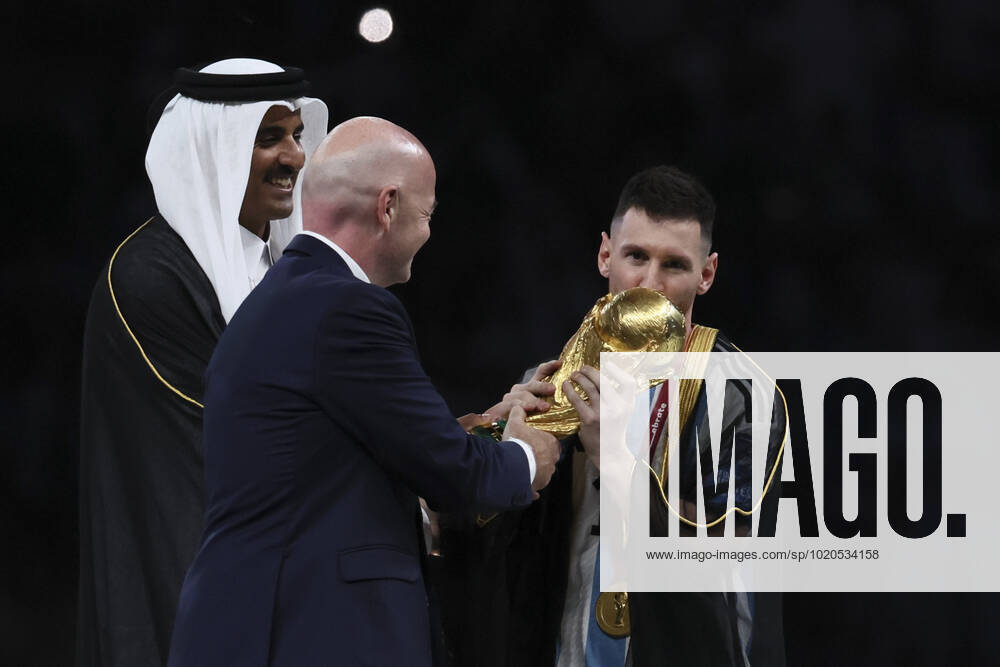 (221218) -- LUSAIL, Dec. 18, 2022 -- FIFA President Gianni Infantino (C) awards Lionel Messi (R) of Argentina during the awarding ceremony of the 2022 FIFA World Cup, WM, Weltmeisterschaft, Fussball at Lusail Stadium in Lusail, Qatar, Dec. 18, 2022. ) (SP)QATAR-LUSAIL-2022 WORLD CUP-FINAL-ARG VS FRA LanxHongguang