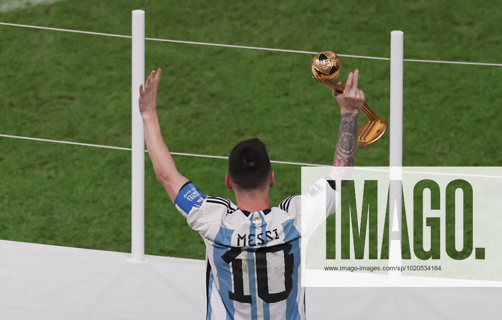 (221218) -- LUSAIER, Dec. 18, 2022 -- Lionel Messi of Argentina celebrates his golden ball award during the awarding ceremony of the 2022 FIFA World Cup, WM, Weltmeisterschaft, Fussball at Lusail Stadium in Lusail, Qatar, Dec. 18, 2022. ) (SP)QATAR-LUSAIL-2022 WORLD CUP-FINAL-ARG VS FRA XuxZijian