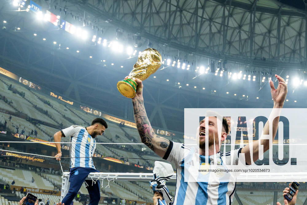 Lionel Messi of Argentina celebrates with the FIFA World Cup, WM, Weltmeisterschaft, Fussball Trophy after winning the FIFA World Cup 2022 final between Argentina and France on December 18, 2022 in Doha. Photo: Joel Marklund BILDBYRAN kod JM JM0415 bbeng fotboll football soccer fotball vm fotbolls-vm fotball-vm fotbolls-vm 2022 fifa world cup 2022 final argentina frankrike france champions world champions FIFA World Cup Champions Gold medalist jubel celebration