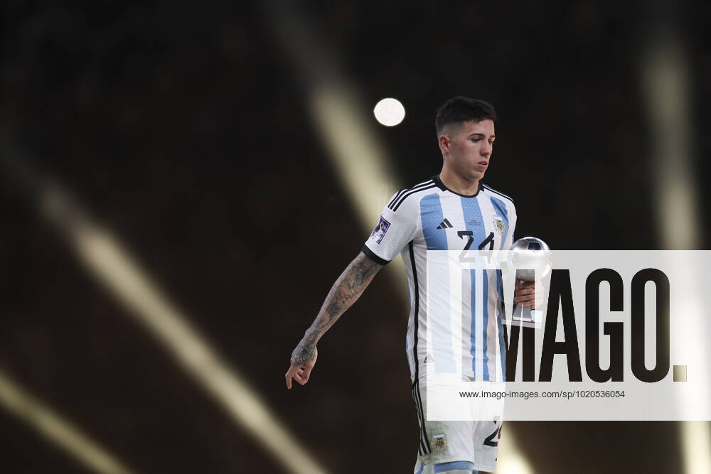 (221218) -- LUSAIER, Dec. 18, 2022 -- Enzo Fernandez of Argentina reacts with the FIFA Young Player award during the awarding ceremony of the 2022 FIFA World Cup, WM, Weltmeisterschaft, Fussball at Lusail Stadium in Lusail, Qatar, Dec. 18, 2022. ) (SP)QATAR-LUSAIL-2022 WORLD CUP-FINAL-ARG VS FRA LixMing
