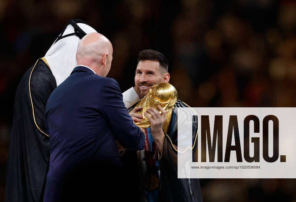 (221218) -- LUSAIL, Dec. 18, 2022 -- FIFA President Gianni Infantino (C) awards Lionel Messi of Argentina during the awarding ceremony of the 2022 FIFA World Cup, WM, Weltmeisterschaft, Fussball at Lusail Stadium in Lusail, Qatar, Dec. 18, 2022. ) (SP)QATAR-LUSAIL-2022 WORLD CUP-FINAL-ARG VS FRA WangxLili