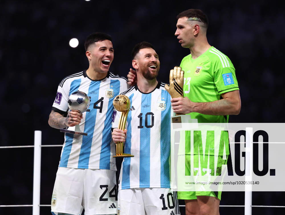 Doha, Qatar, 18th December 2022. Enzo Fernandez of Argentina Young player of the Tournament, Lionel Messi of Argentina player of the Tournament and Golden Glove winner Emiliano Martinez of Argentina during the FIFA World Cup, WM, Weltmeisterschaft, Fussball 2022 match at Lusail Stadium, Doha. Picture credit should read: David Klein Sportimage . SPI-2101-0215