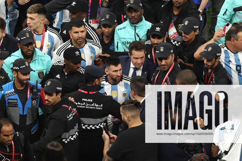 The Final : FIFA World Cup, WM, Weltmeisterschaft, Fussball 18 December 2022, Lusail City - FIFA World Cup Final Qatar 2022 - Argentina v France - Lionel Messi of Argentina makes his way to the dressing room with the help of security - Photo: Charlotte Wilson Offside. Doha Qatar